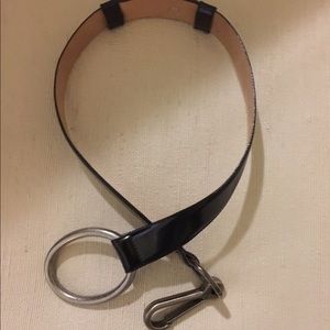 Oblong metal buckle with clasp